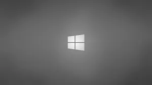 Windows Logo Against Solid Grey Background Wallpaper