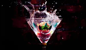 Wine Glass Drinks With Fruit Splashing Wallpaper