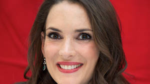 Winona Ryder Red Background Wallpaper