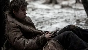 Winter_ Survival_ Scene_ Will_ Poulter Wallpaper