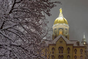 Wintry University Of Notre Dame Golden Dome Wallpaper