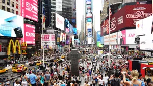 Witness The Magical Lights Of Times Square Wallpaper