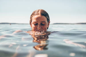 Woman In Water Wallpaper