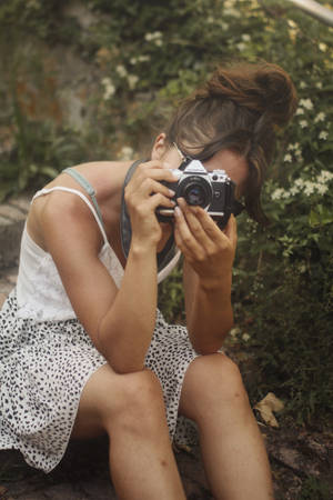 Woman In White Tank Top Holding Black And Silver Dslr Camera Wallpaper