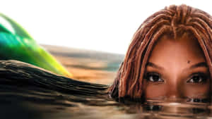 Woman Peering Through Water Wallpaper