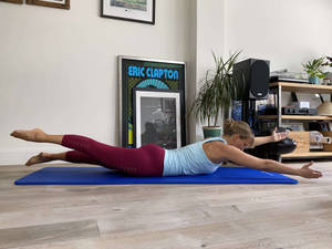 Woman Performing Pilates Wallpaper