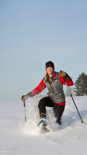 Woman Snowshoeing Portrait Wallpaper