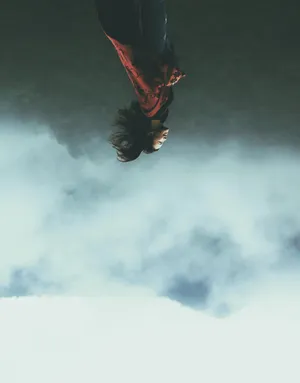 Woman Standing On Mountain Top During Daytime Wallpaper