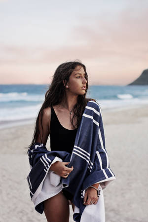 Woman Wearing Monokini And Standing On Seashore Wallpaper