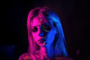 Woman With Blue Hair And Black Eyes Wallpaper