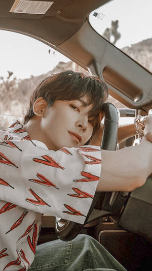 Wonwoo Riding A Car Wallpaper