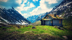 Wooden House On Mountain Top Wallpaper