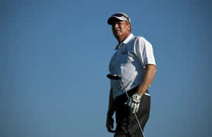 Woody Austin Holding A Golf Club Wallpaper