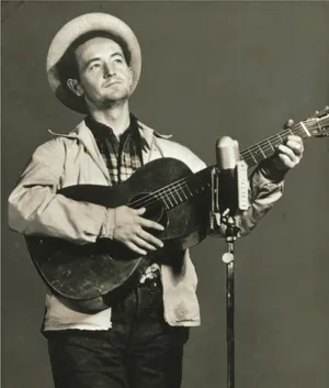 Woody Guthrie Guitar Folk Singer Wallpaper