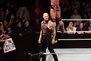 Wrestler Baron Corbin Standing In The Ring Wallpaper