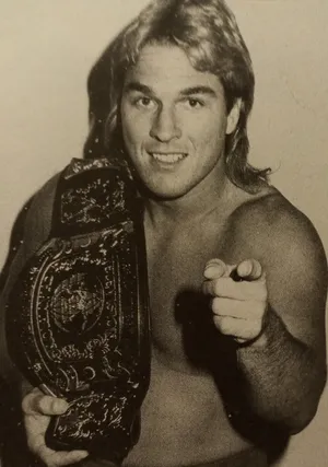 Wrestler With Championship Belt Wallpaper