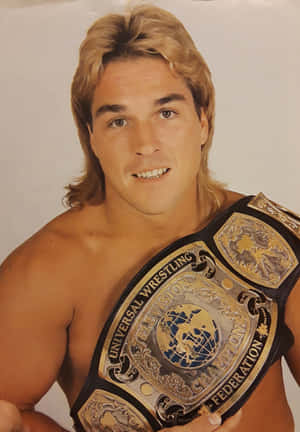 Wrestlerwith Championship Belt Wallpaper