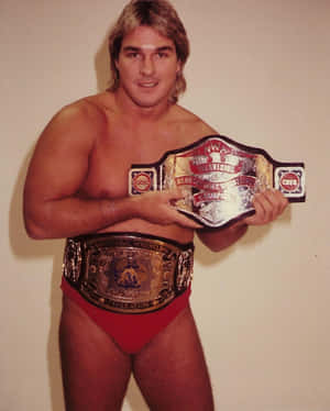 Wrestlerwith Championship Belts Wallpaper