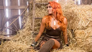 Wwe Wrestler Becky Lynch In Haystack Wallpaper