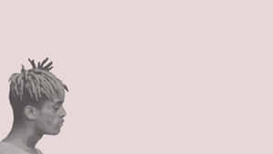 Xxxtentacion In Front Of A Computer Wallpaper