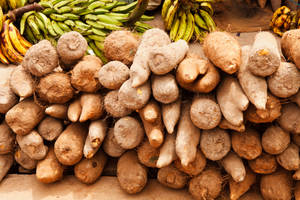 Yam And Bananas In Marketplace Wallpaper