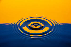 Yellow And Blue Moving Water Wallpaper