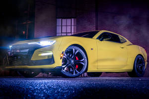 Yellow Chevrolet Camaro At Night Wallpaper