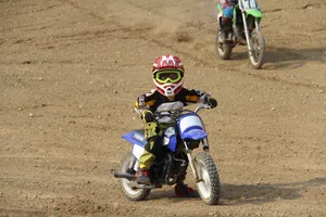 Young Racer At Motocross Racing Wallpaper