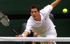 Young Tim Henman Intensively Playing Tennis Wallpaper