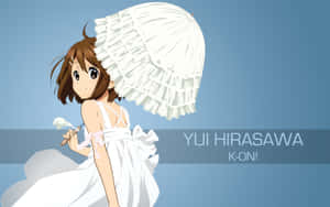 Yui Hirasawa Rocking Her Guitar In A Captivating Pose Wallpaper