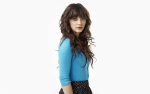 Zooey Deschanel In Blue Preppy Outfit Wallpaper