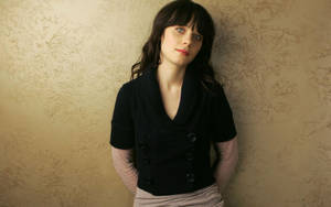 Zooey Deschanel On Gold Aesthetic Background Wallpaper